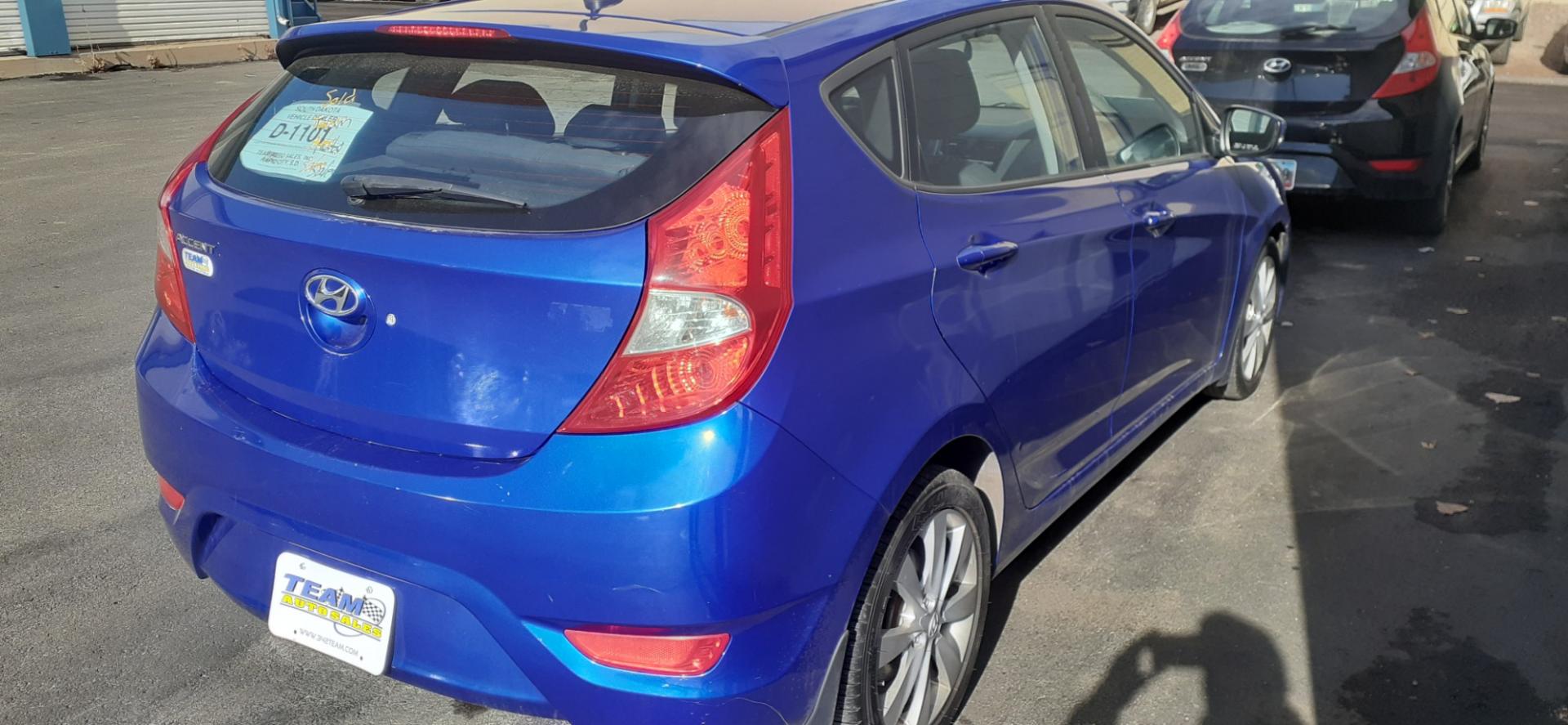 2013 Hyundai Accent SE 5-Door (KMHCU5AE2DU) with an 1.6L L4 DOHC 16V engine, located at 2015 Cambell Street, Rapid City, SD, 57701, (605) 342-8326, 44.066433, -103.191772 - CARFAX AVAILABLE - Photo#3